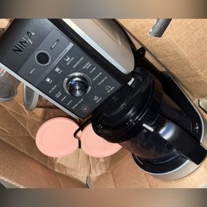 Ninja Creami. With 4 storage containers.